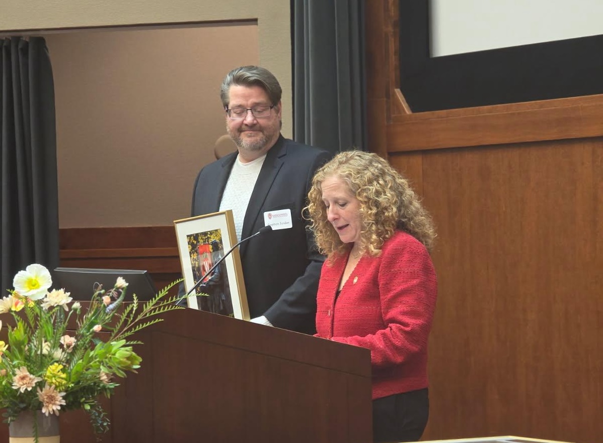 Stephen Jordan receives and award from Chancellor Mnookin.