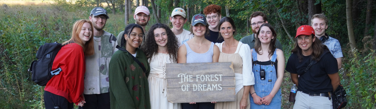 Kristyn Dallmann (BA' 25) stands in the center of her cast and crew for her 2024 narrative short, "The Forest of Dreams." Dallmann won a 2025 Creative Arts Award for her work on this project. 