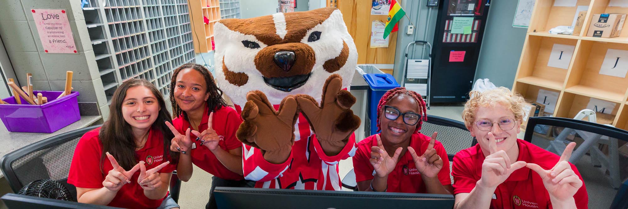 University Housing employees with Bucky Badger