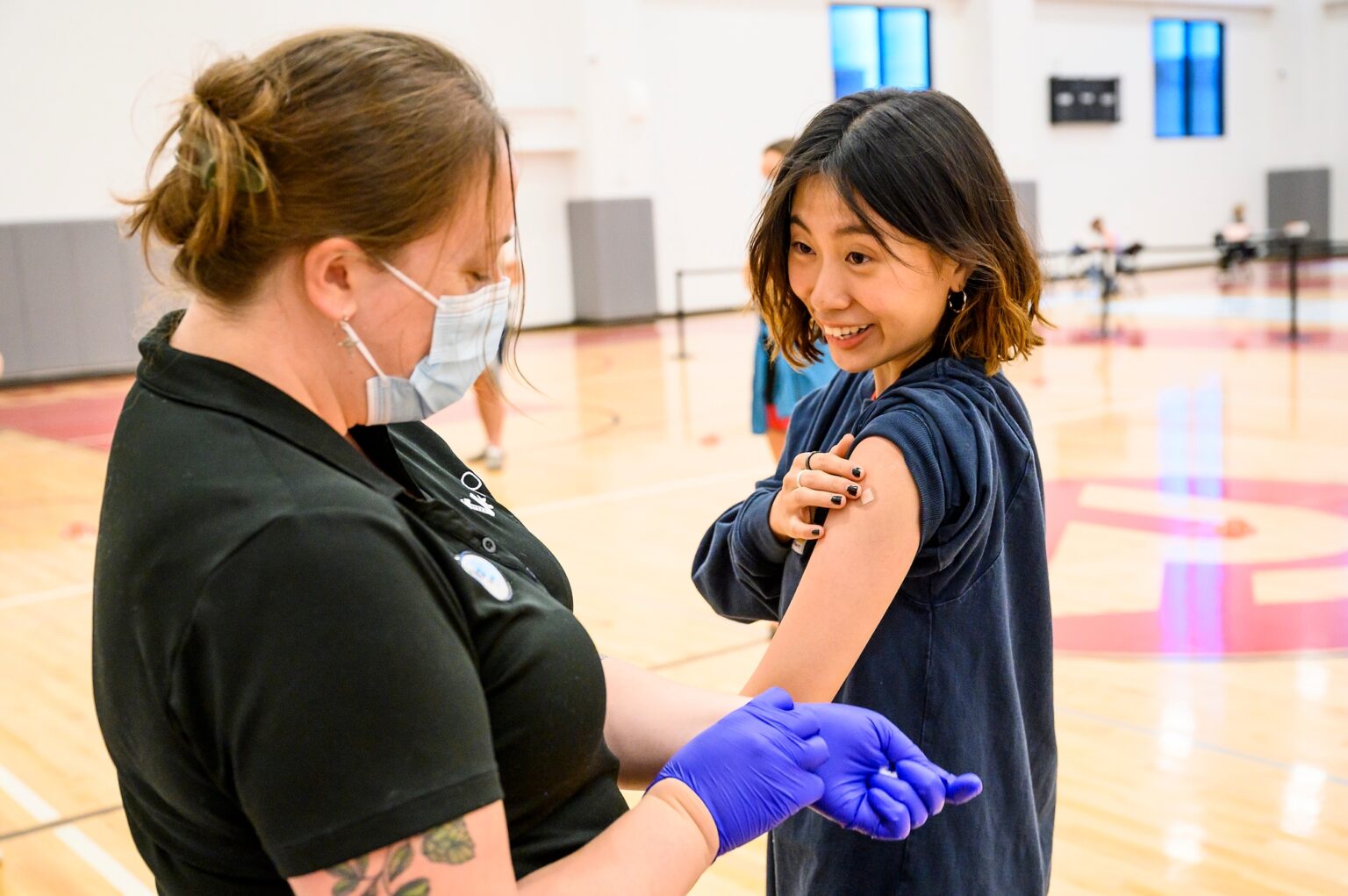Photo of a student at a UHS vaccine clinic